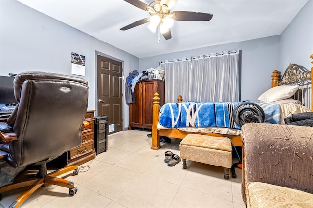 tiled bedroom with ceiling fan