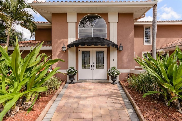 doorway to property with french doors