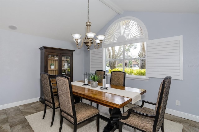 dining room featuring a notable chandelier, lofted ceiling with beams, and a healthy amount of sunlight