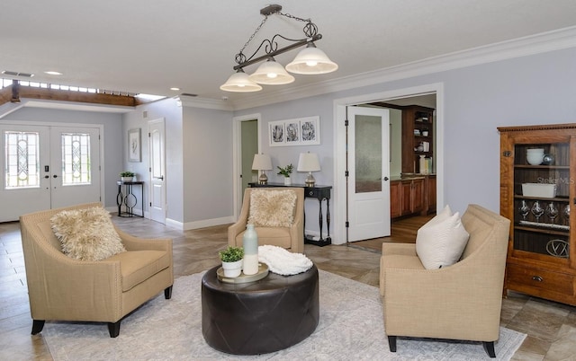 living room featuring ornamental molding and french doors