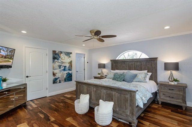 bedroom with dark wood-type flooring, ceiling fan, and crown molding