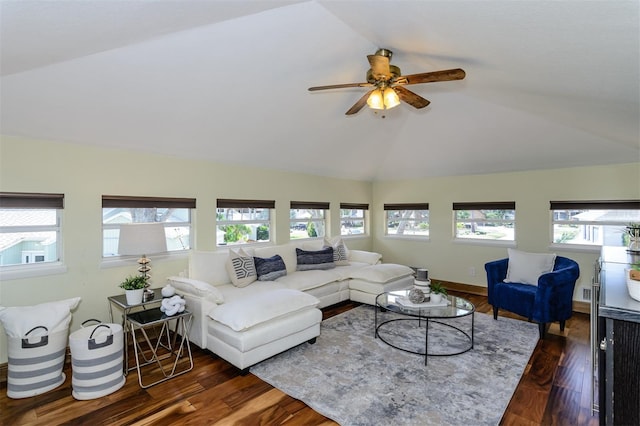 living room featuring ceiling fan, lofted ceiling, and dark hardwood / wood-style flooring