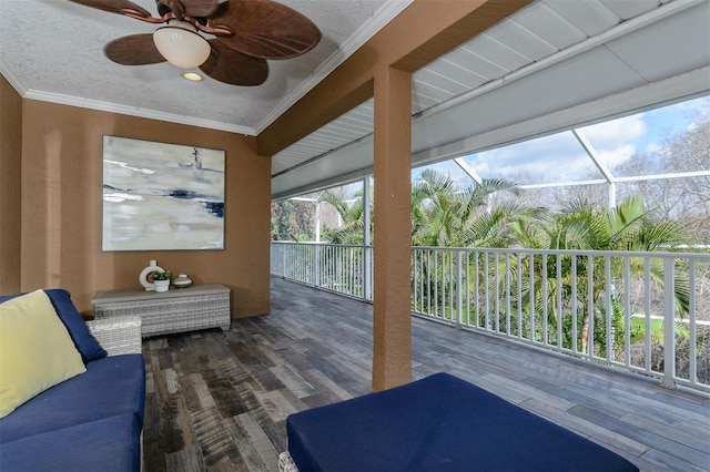 deck with a lanai, outdoor lounge area, and ceiling fan