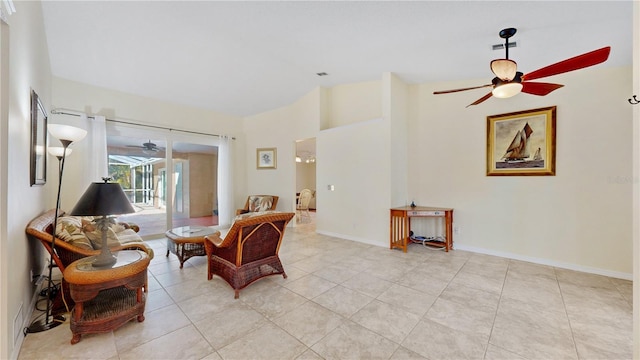 sitting room featuring light tile patterned floors and ceiling fan