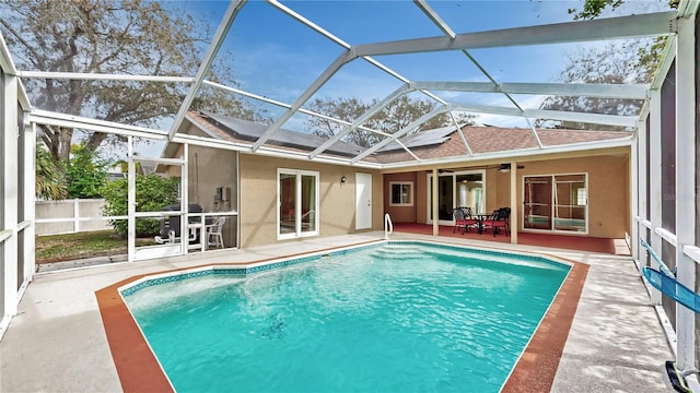 view of pool with a lanai and a patio