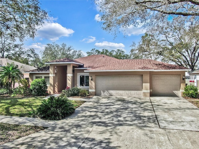 view of front of home with a garage