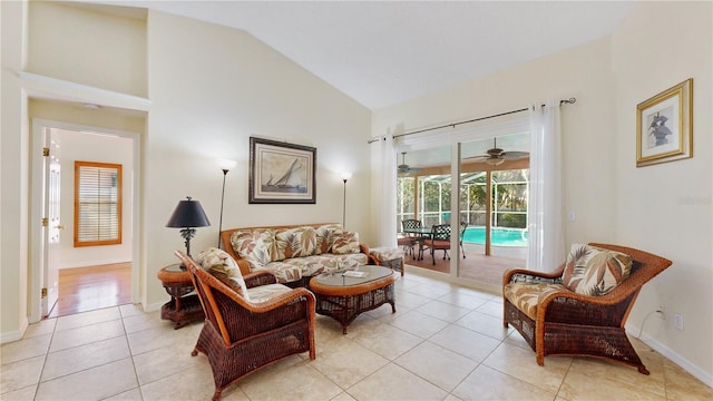 tiled living room with high vaulted ceiling