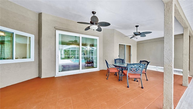 view of patio featuring ceiling fan