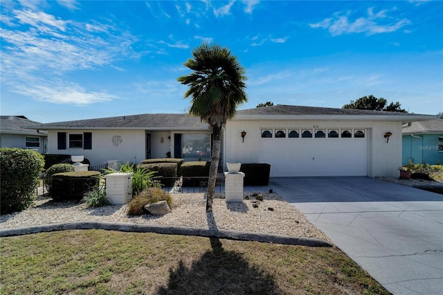 single story home featuring a garage