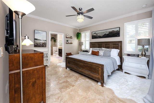 bedroom with crown molding, ceiling fan, and ensuite bath