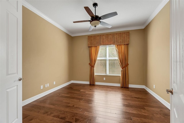 empty room with ornamental molding, dark hardwood / wood-style floors, and ceiling fan