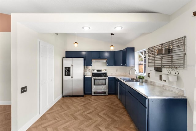 kitchen featuring sink, light parquet floors, appliances with stainless steel finishes, hanging light fixtures, and blue cabinets