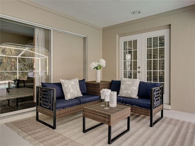 view of patio featuring french doors and outdoor lounge area