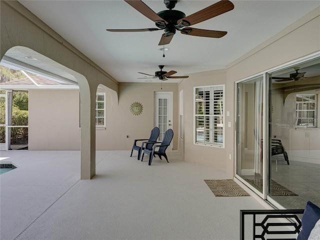 view of patio / terrace featuring ceiling fan