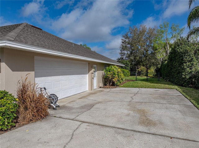 garage with a lawn