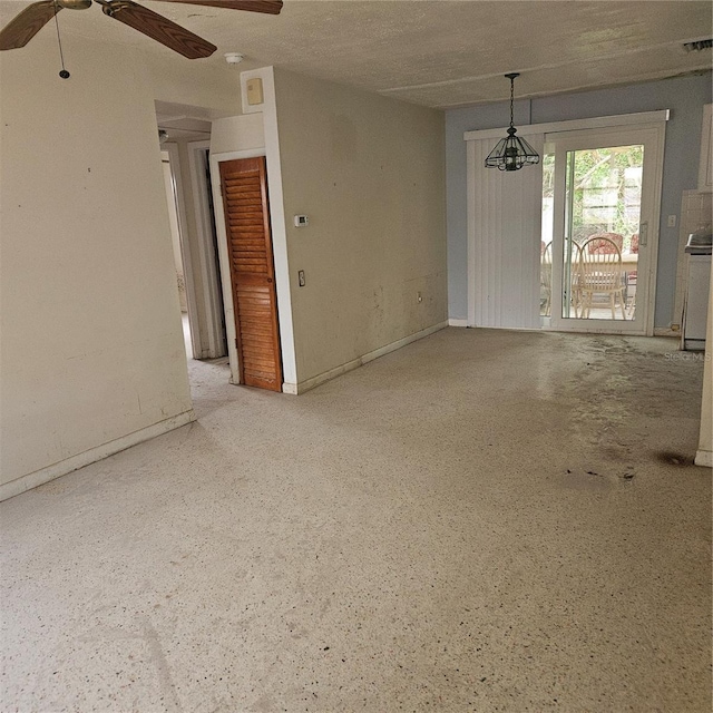 unfurnished room featuring ceiling fan