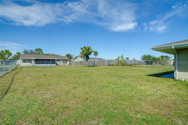 view of yard featuring a fenced backyard