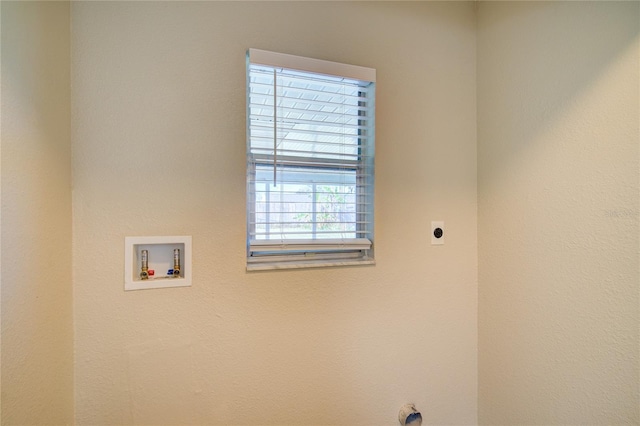 washroom featuring hookup for a washing machine, laundry area, and electric dryer hookup