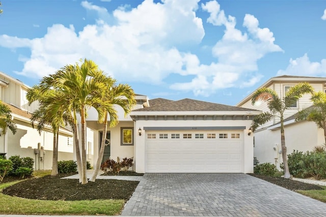 view of front of property with a garage