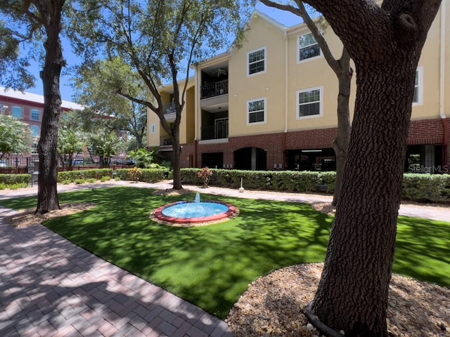 view of community featuring a yard