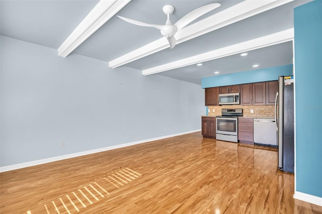 kitchen featuring tasteful backsplash, light hardwood / wood-style flooring, beamed ceiling, ceiling fan, and stainless steel appliances