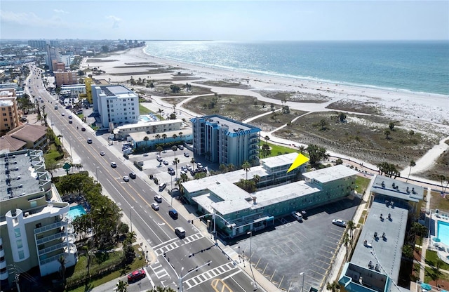 aerial view featuring a view of the beach and a water view