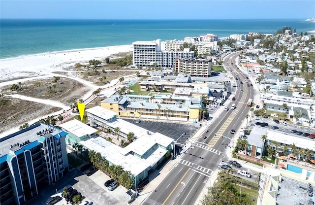 drone / aerial view with a view of the beach and a water view