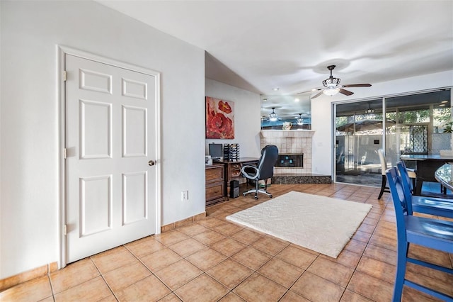 2786 Countryside Blvd Unit 2, Clearwater, FL 33761 - tiled home office featuring a tiled fireplace and ceiling fan