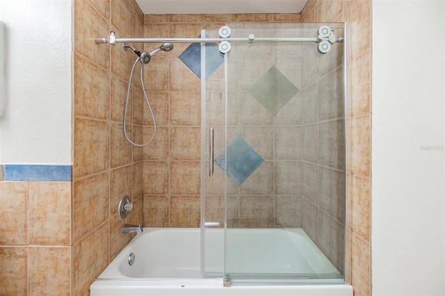 2786 Countryside Blvd Unit 2, Clearwater, FL 33761 - bathroom featuring bath / shower combo with glass door