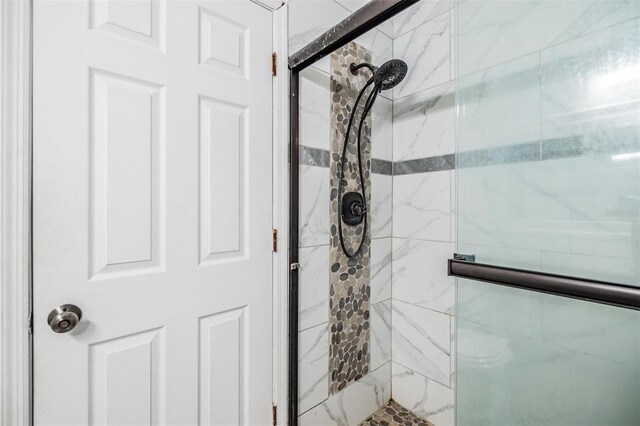 2786 Countryside Blvd Unit 2, Clearwater, FL 33761 - bathroom with a shower with door
