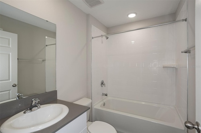 full bathroom featuring shower / washtub combination, vanity, and toilet