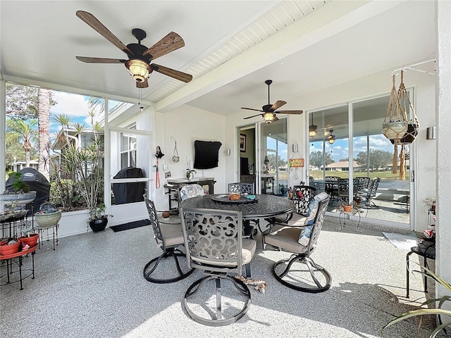view of patio / terrace featuring ceiling fan and outdoor dining space