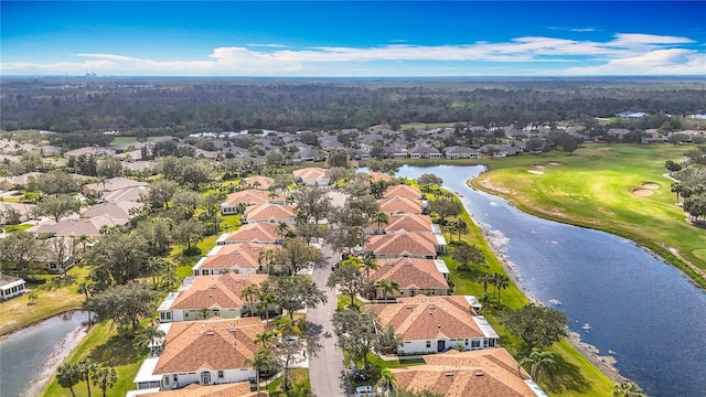 bird's eye view featuring a residential view and a water view