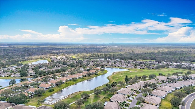 aerial view with a residential view and a water view