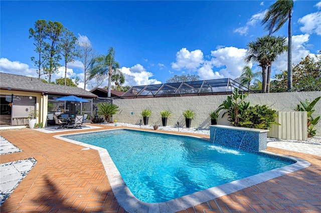 view of swimming pool with a patio area, a fenced backyard, and a fenced in pool