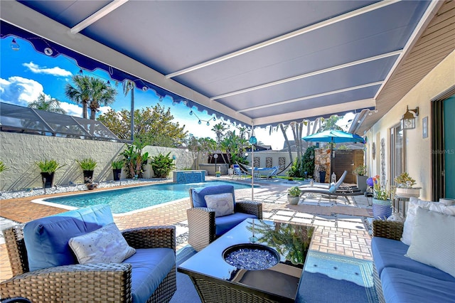 view of patio with a fenced in pool, outdoor lounge area, and a fenced backyard