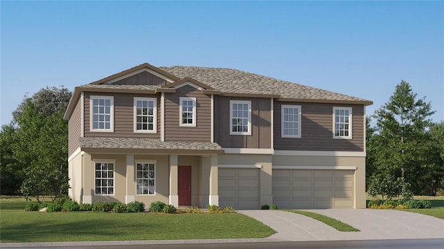 view of front of home with a garage and a front yard