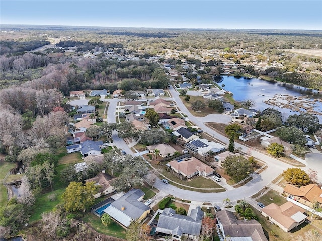 birds eye view of property with a residential view and a water view