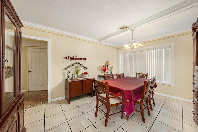 tiled dining room with ornamental molding, a textured ceiling, and a chandelier