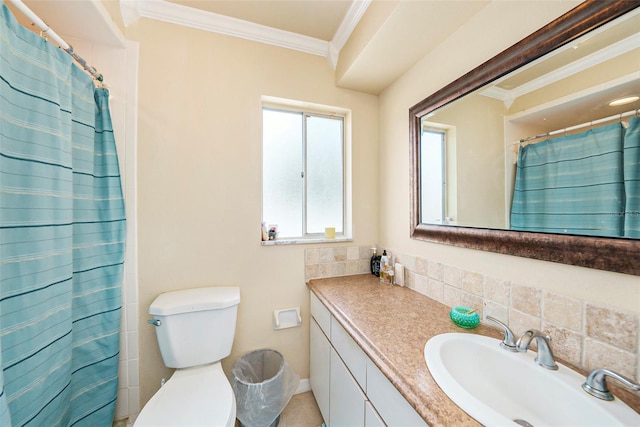 bathroom with crown molding, toilet, vanity, and decorative backsplash