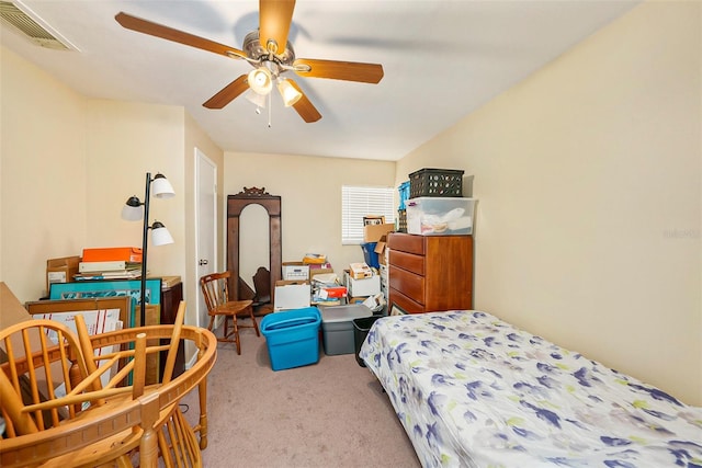 bedroom featuring light carpet