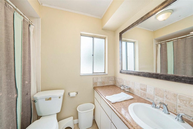 bathroom with backsplash, a shower with shower curtain, vanity, ornamental molding, and toilet