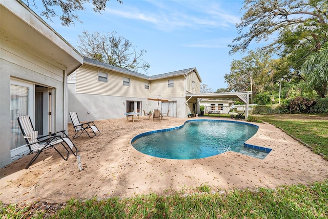 view of pool featuring a patio area