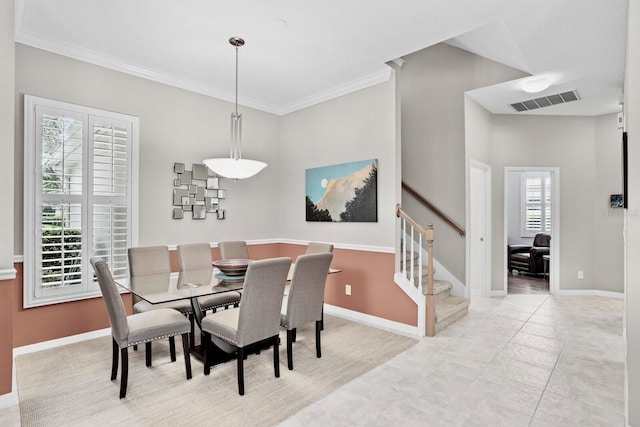 dining area featuring visible vents, stairway, ornamental molding, light tile patterned flooring, and baseboards