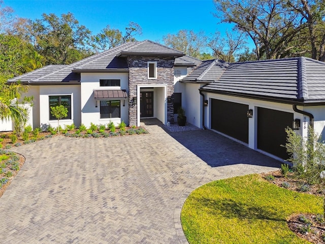 view of front of home with a garage