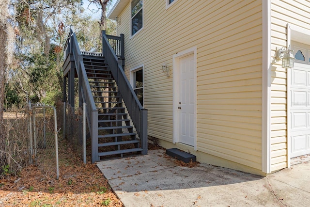 doorway to property with fence