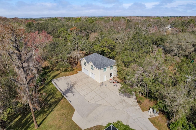 drone / aerial view with a forest view