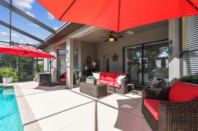 view of patio / terrace with ceiling fan, an outdoor living space, and a lanai