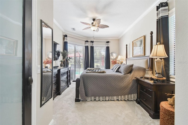 bedroom with light colored carpet, visible vents, ceiling fan, and ornamental molding