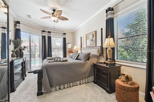 bedroom with light carpet, crown molding, and multiple windows